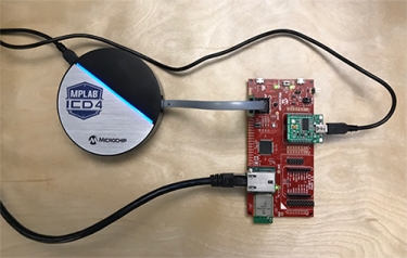 The PIC32MZEF Curiosity Development Kit assembled and connected to an ICD4 programming tool. This setup uses a wired Ethernet connection to run the demonstration. (Image source: Amazon)