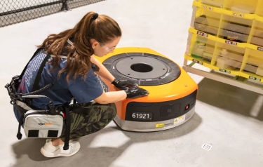 Amazon staff wear special belts to avoid robot injuries (Credit: Amazon/TechCrunch)