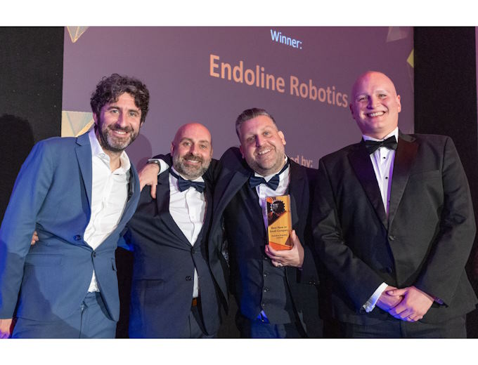 In the centre, receiving the award, are Endoline’s Richard Yates, Operations Director, and Andrew Yates, Managing Director